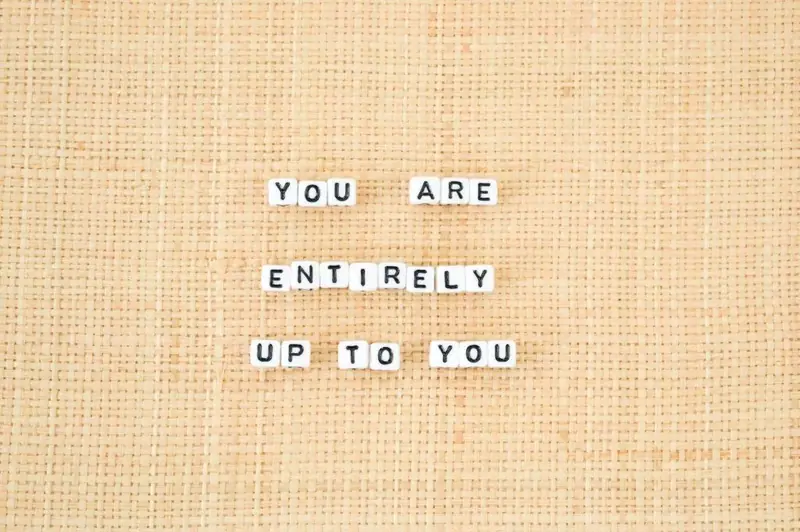 Letter tiles reading “You are entirely up to you”