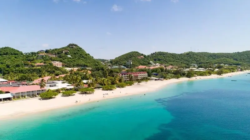 Aerial view of a beach and turquoise water in Grenada