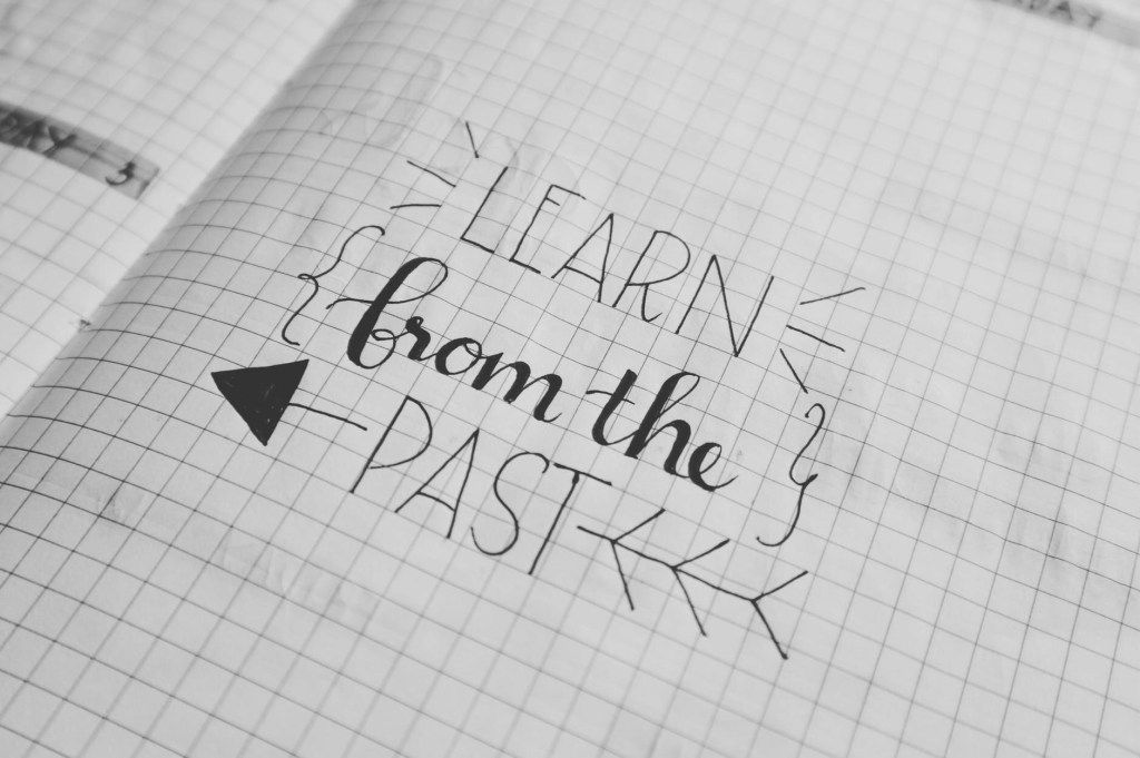 Notebook page reading “Learn from the past”